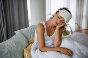 a person with a toothache trying to sleep